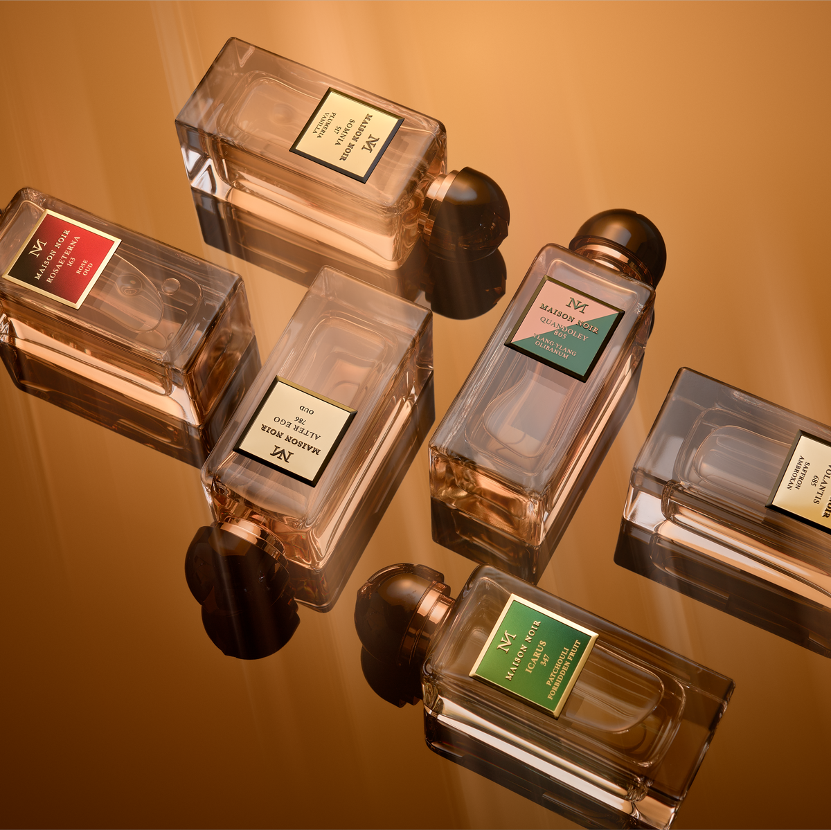 Five rectangular glass perfume bottles with labeled tags arranged on a warm golden background, each containing amber-toned liquid and topped